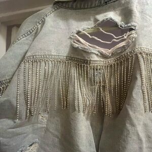 Distressed Denim Jacket with Fringe